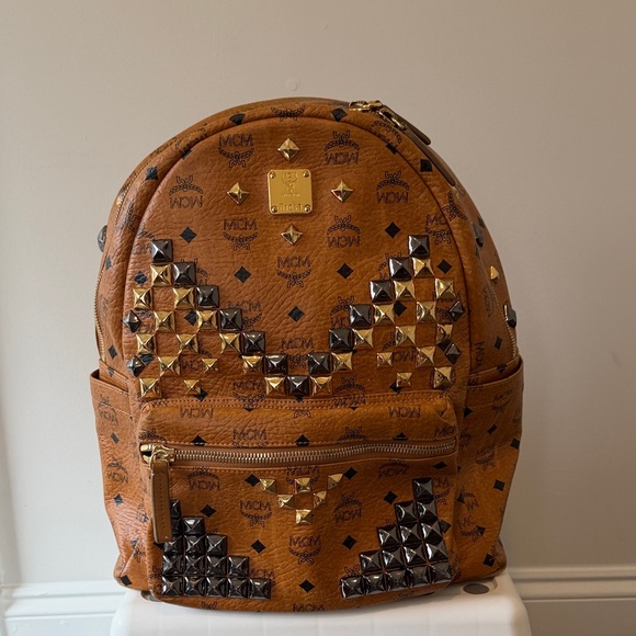 MCM Handbags - MCM Cognac Backpack with Gold and Black Studs
